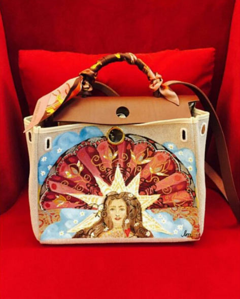 LOOK: Heart paints on Hermes, Prada bags | ABS-CBN News